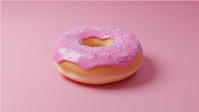 A donut representing a donut chart on a pink background.